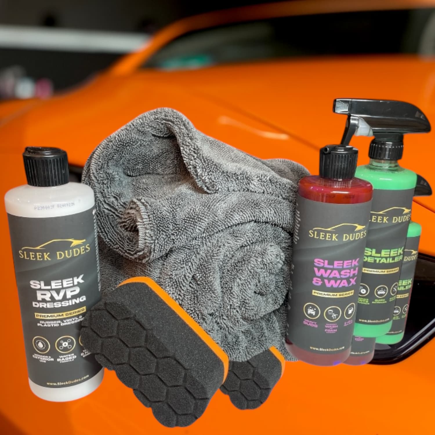 Sleek Dudes Car care Kit and Bundle Collection save money and bundle Feuturing Sleek Dudes products with a orange car background
