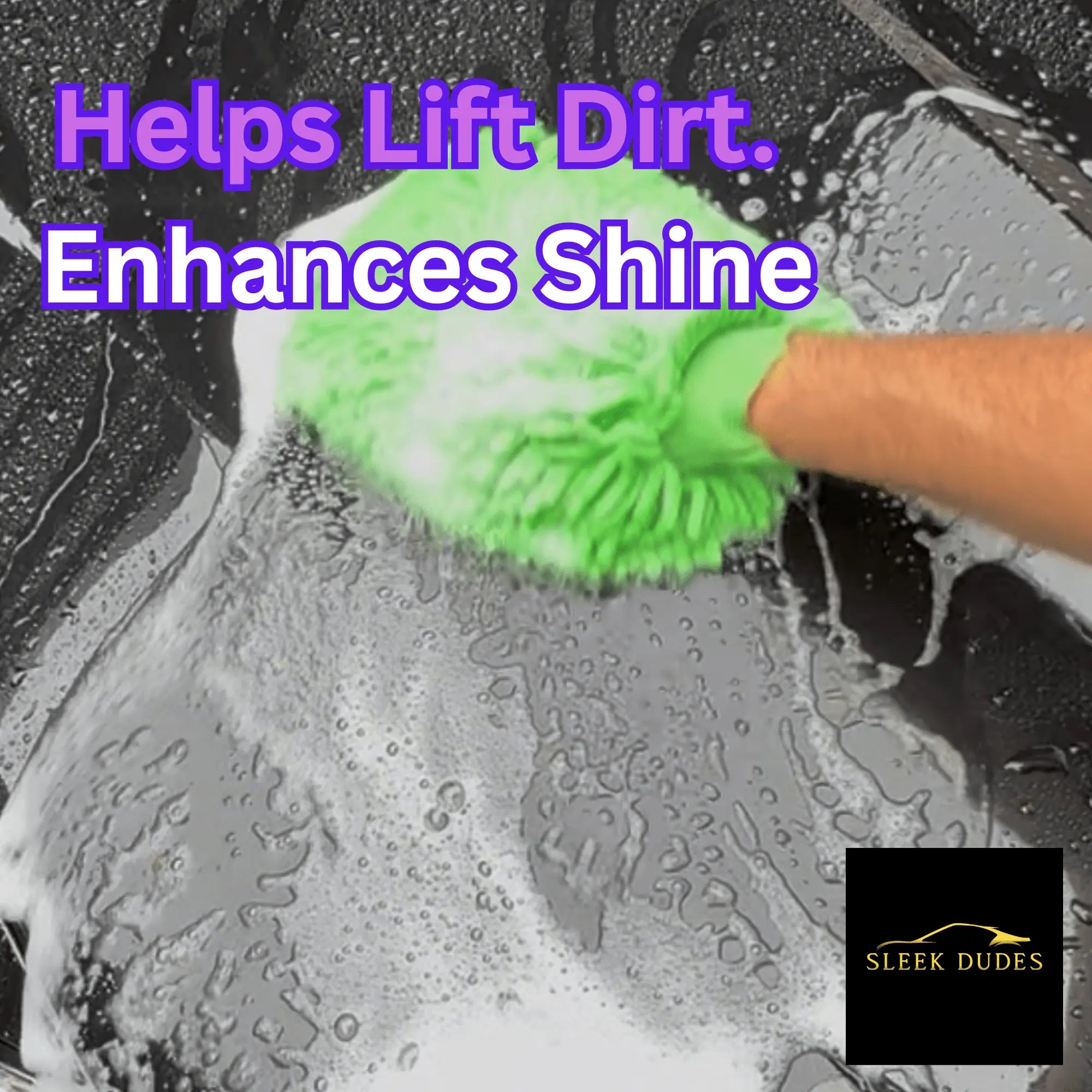 Hand using green wash mitt with Sleek Dudes soap on car hood — lifts dirt and enhances shine.