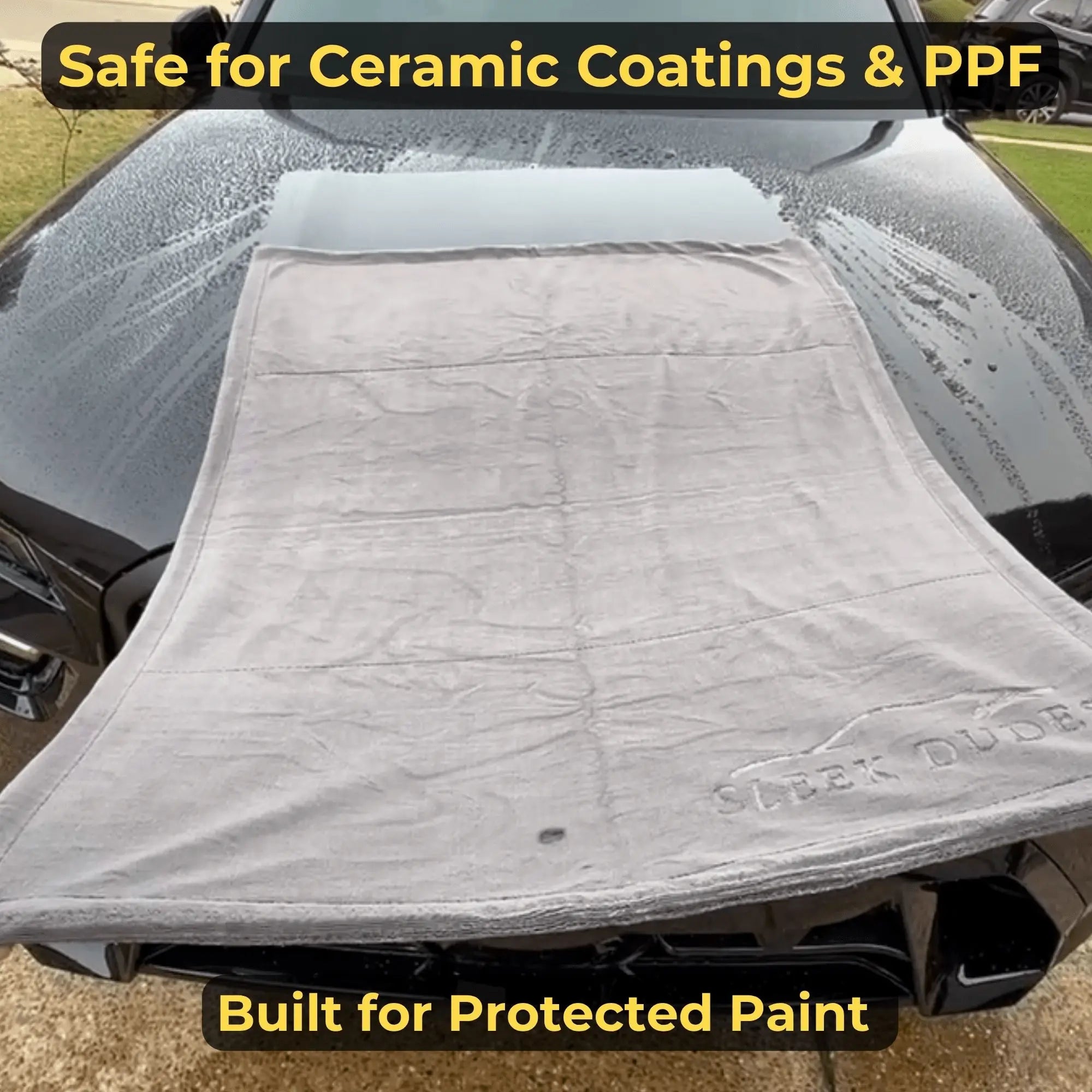 Car hood with a protective cover and text about being safe for ceramic coatings and PPF.