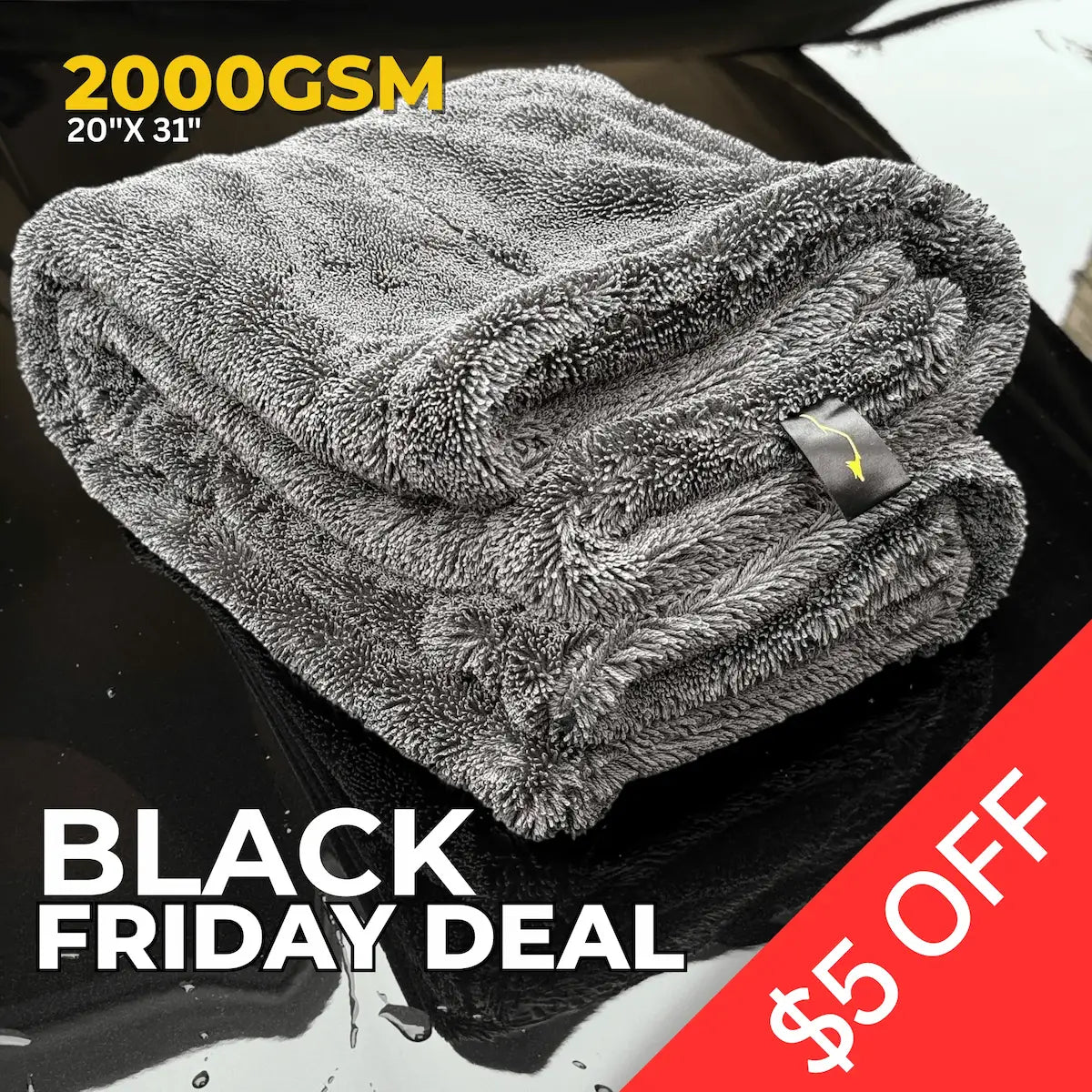 Folded car drying towel on a black hood with Black Friday Deal sale $5 off