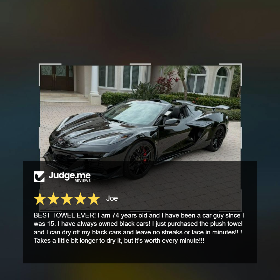 Black sports car parked in front of a house with a Judge.me review overlay.