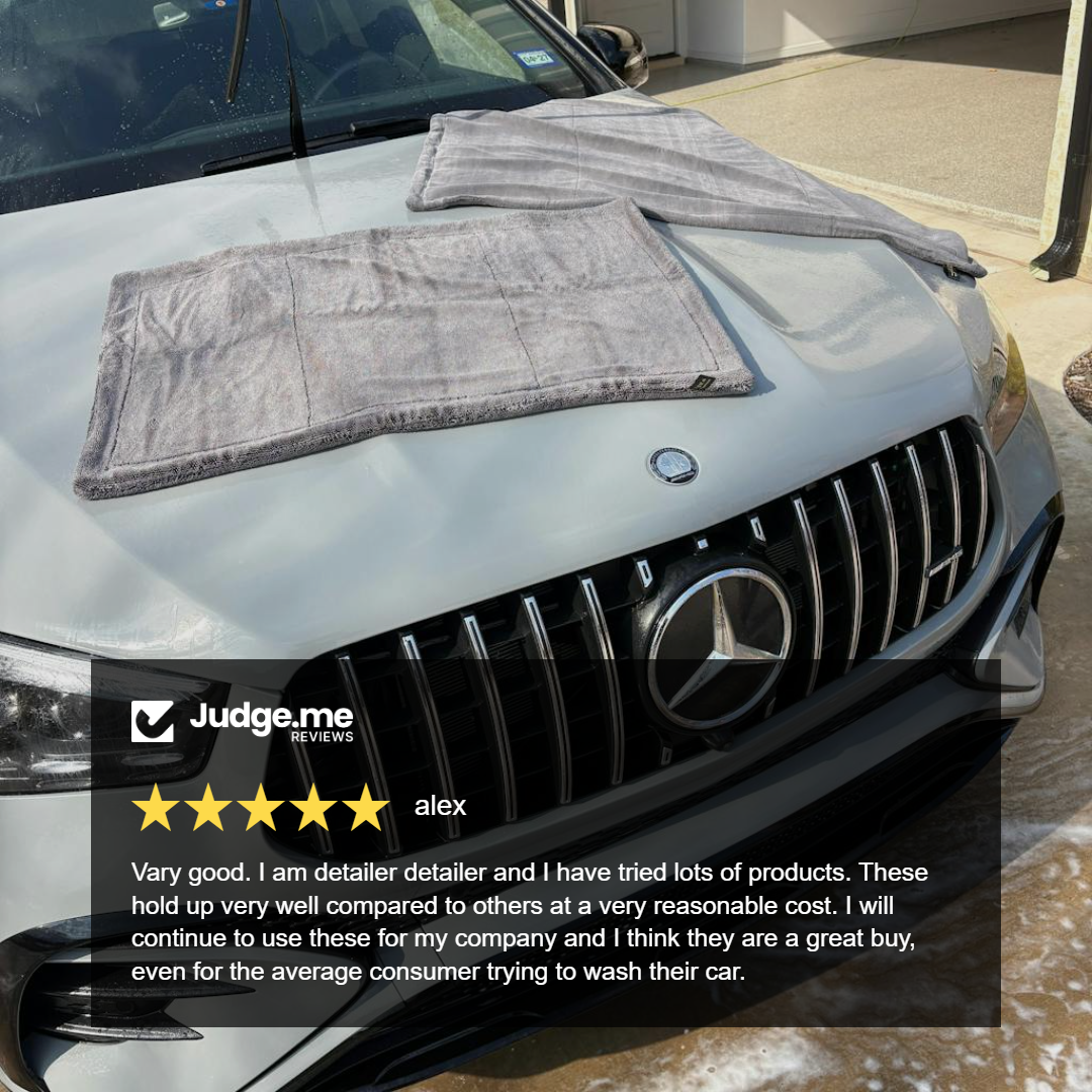 Car hood with towels and Mercedes logo, featuring a five-star review from Judge.me.