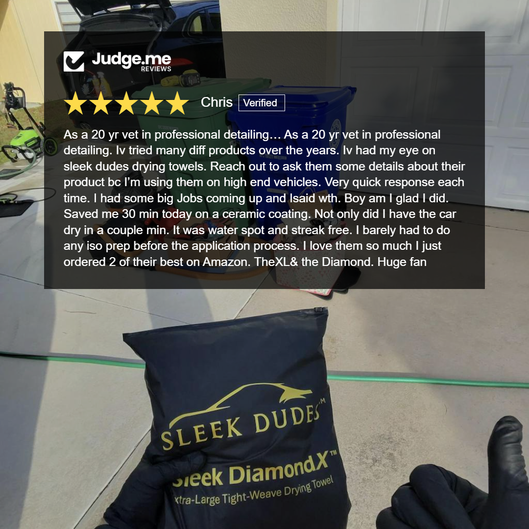 Person holding a 'Sleek Dude' towel with a car detailing background and Judge.me review overlay.