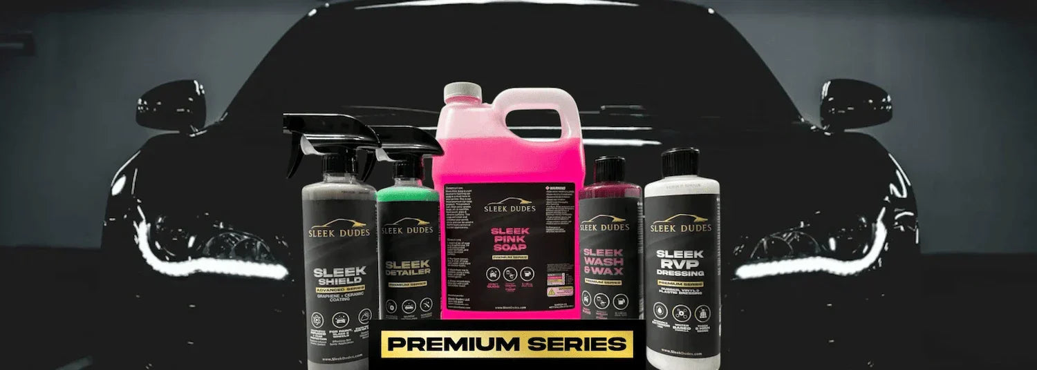 Sleek Dudes car wash and wax products displayed in front of a black car