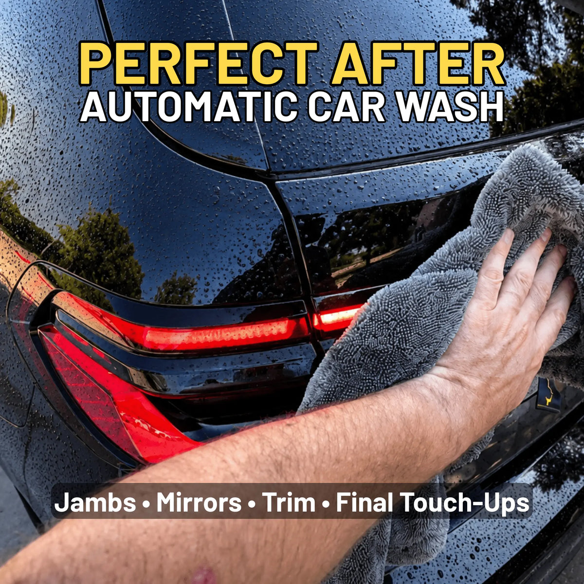 A close-up of a hand wiping a black car with a gray microfiber towel, with text overlays reading 'PERFECT AFTER AUTOMATIC CAR WASH' and 'Jambs • Mirrors • Trim • Final Touch-Ups'.