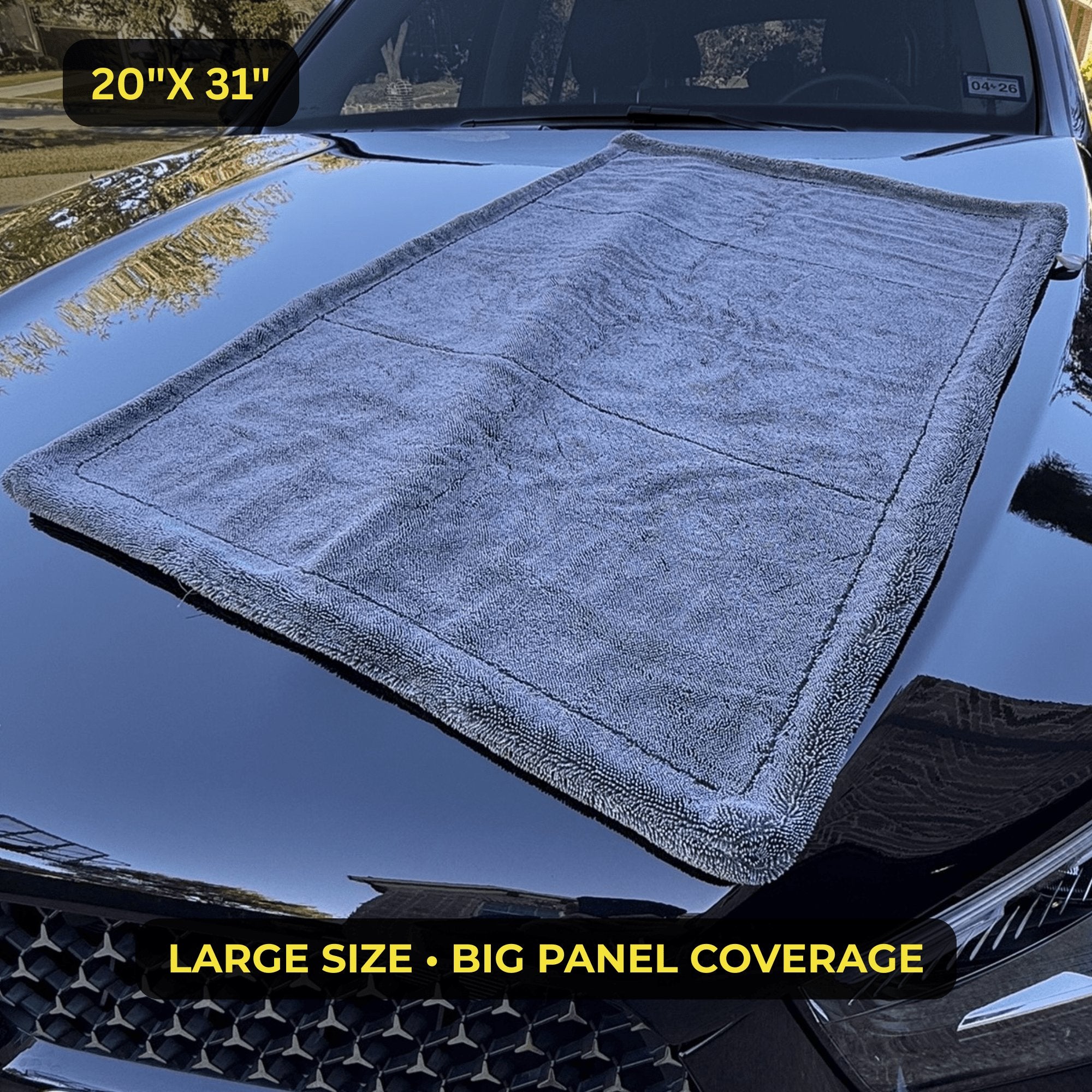 Car towel covering a car's hood with text indicating size and features.
