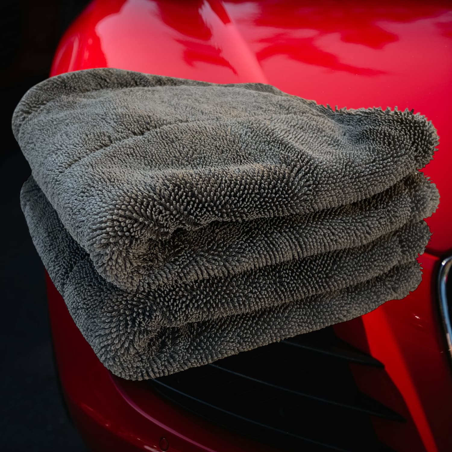 Sleek Dudes Drying towels collection on a red car