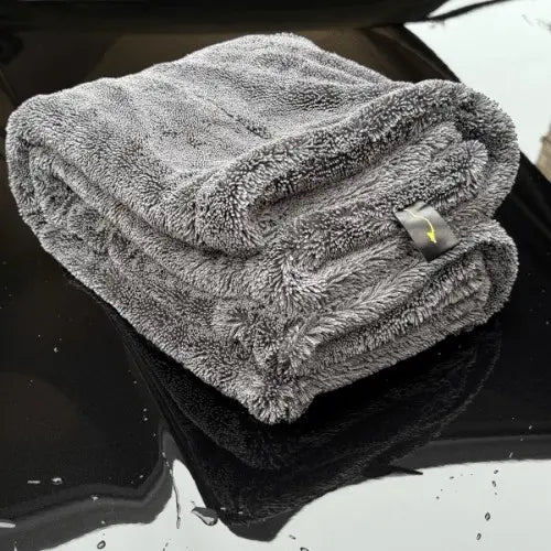 Gray Sleek Max Dry 2K microfiber  towel on a car surface